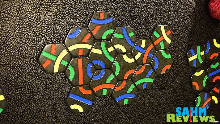 Tantrix by Family Games America looks simple, but has some REAL strategy going on. It'll become your favorite travel game! - SahmReviews.com