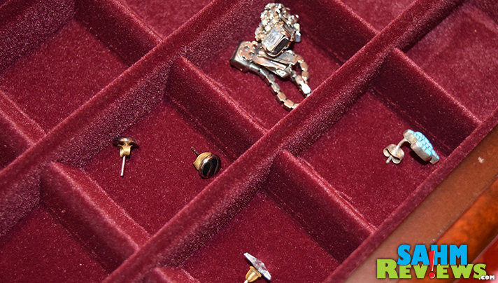 Small compartments help keep earrings and pins organized. - SahmReviews.com