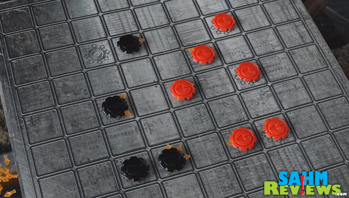 By today's standards, checkers is boring. What if you could "program" your pieces to move in different directions? Octi from FoxMind Games does just that! - SahmReviews.com