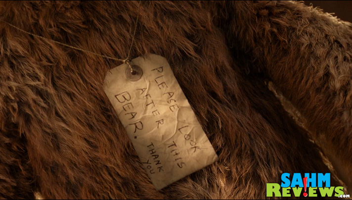 Such a recognizable tag: "Please Look After This Bear." - SahmReviews.com #PaddingtonMovie