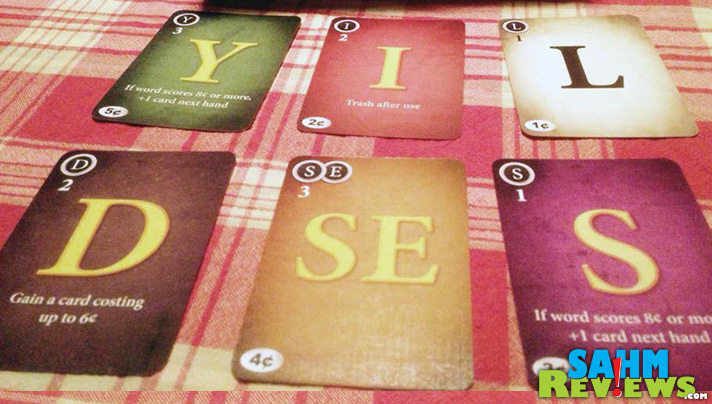 The new Paperback Game is a mix of Scrabble and Dominion. It's a deck-builder that has less to do with luck and more to do with your word vocabulary. - SahmReviews.com