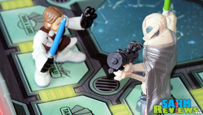 If you're awaiting the release of Star Wars: Episode VII - The Force Awakens, bide your time with a battle or two in Milton Bradley's Galactic Heroes game. - SahmReviews.com