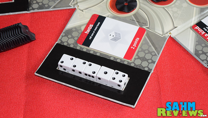 Today's Thrift Treasure is an update of the classic Yahtzee. Not only can you roll straights, full houses and Yahtzees, you can steal them from each other! - SahmReviews.com