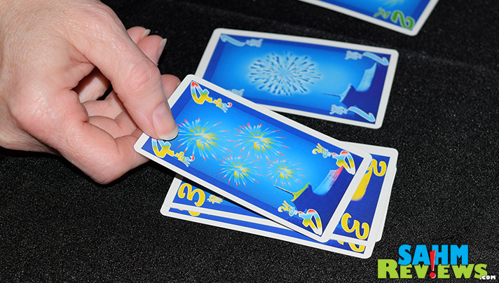 Fireworks building in Hanabi was our other 4th of July board game choice. This cooperative title from R&R Games is a favorite any time of the year! - SahmReviews.com