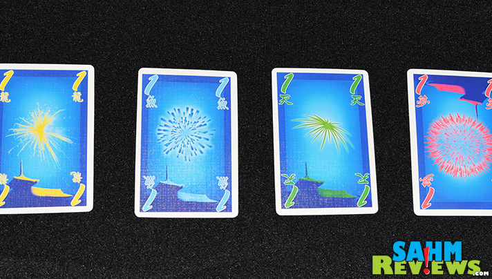 Fireworks building in Hanabi was our other 4th of July board game choice. This cooperative title from R&R Games is a favorite any time of the year! - SahmReviews.com
