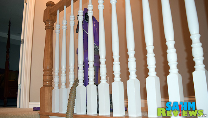 Here's one solution when vacuuming the stairs to keeping the vacuum from falling on you. - SahmReviews.com