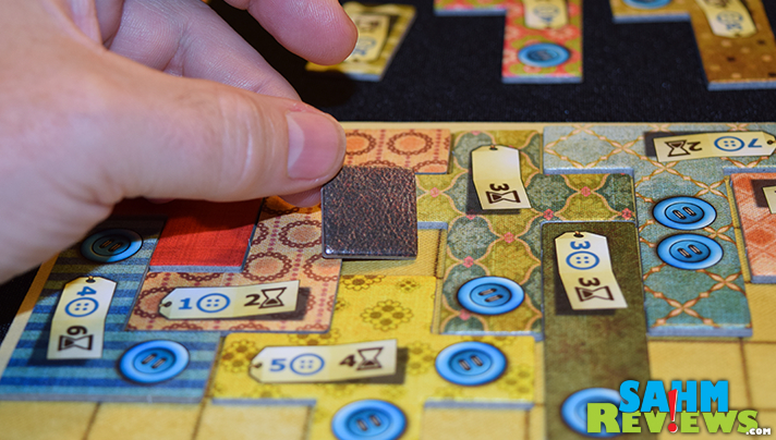 It doesn't matter if you ever learned to sew or not! Patchwork from Mayfair Games will have you making your own quilt in no time! - SahmReviews.com