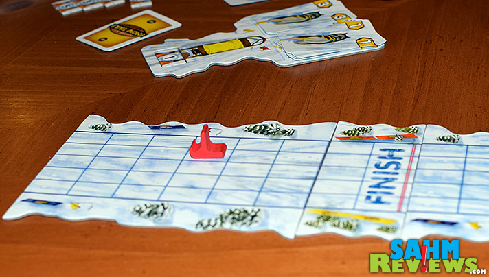 Host your own Iditarod in your home with Snow Tails by Renegade Game Studios! We take a look at this racing game in the warmth of our own house! - SahmReviews.com