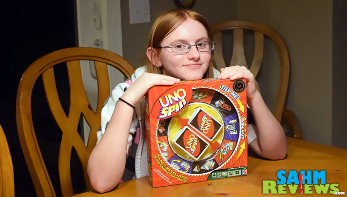 Uno Spin takes the traditional game and gives it an element of randomness. Try to hurt your opponents and you may end up helping them! - SahmReviews.com