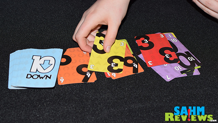 10 Down by CSE Games adds a new twist to the classic trick-taking card game genre. Find out what they've done that no one else has! - SahmReviews.com