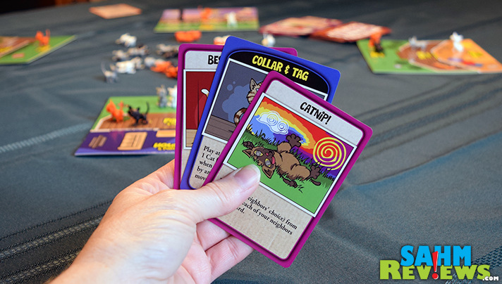 So many cats and they all need homes. Here Kitty Kitty by Fireside Games has neighbors vying to lure the cats in. - SahmReviews.com