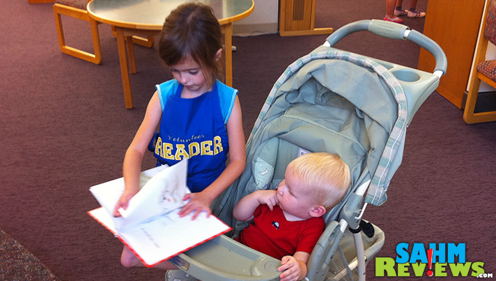 Our daughter had just learned to read when she decided to volunteer at the library. - SahmReviews.com #StreamTeam 