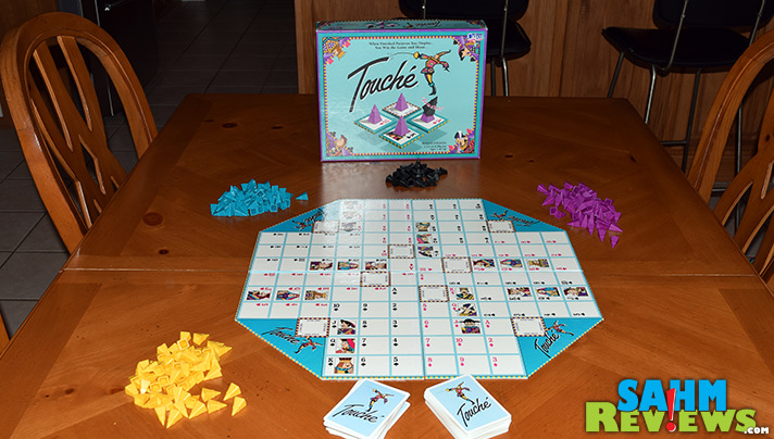 Touché is a mix of Sequence and Tic-Tac-Toe. Find out why we were excited to add this abstract game by Cadaco to our collection! - SahmReviews.com