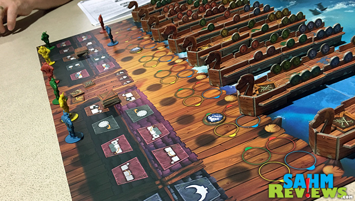 Vikings on Board from Blue Orange Games has players vying to take control of the ships and the supplies before they set sail. - SahmReviews.com