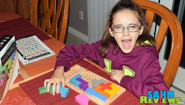 Most puzzles are designed for one player. Katamino by Gigamic puts a little extra in the box with a two-player challenge version! - SahmReviews.com