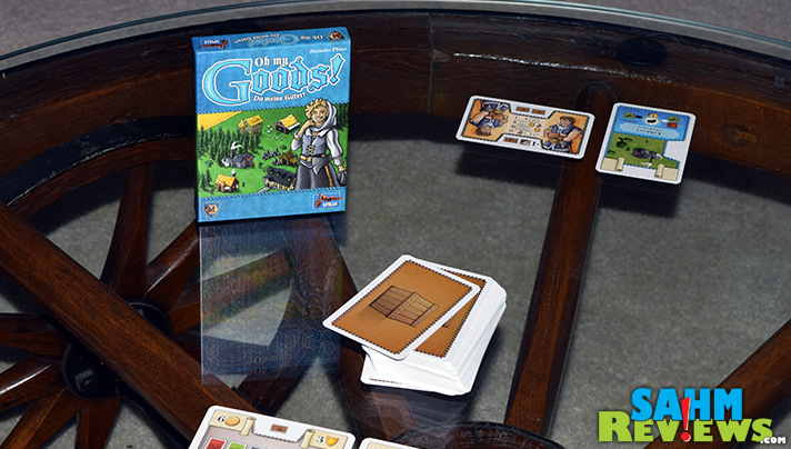 What do you do if you love worker placement games but hate fiddling with wooden meeples? Check out Oh My Goods! by Mayfair Games for your solution! - SahmReviews.com