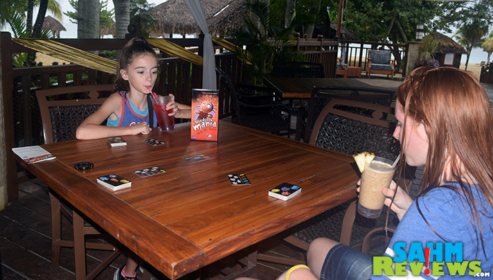 We learned from our last trip and came prepared for the rain with Passport Game Studios' Voodoo Mania! Even better since our trip was to Jamaica! - SahmReviews.com
