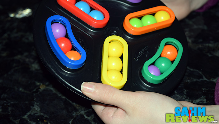 Not all puzzles are made from cardboard. This hand-held 3-D version by ThinkFun should keep you entertained for quite a while. Read more about Back Spin! - SahmReviews.com