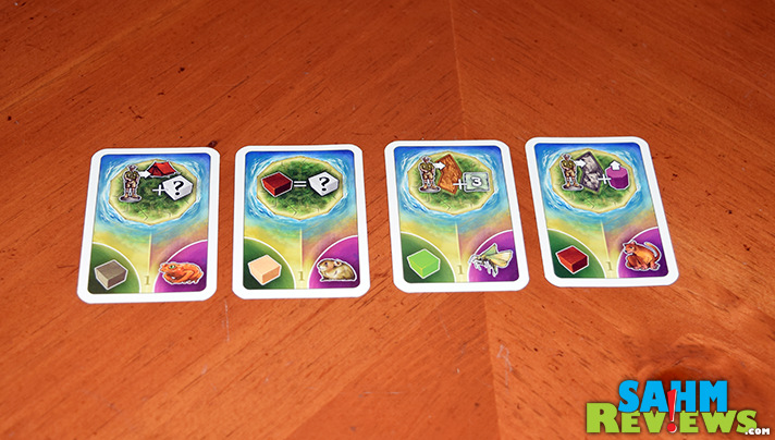 Use your cards wisely to gather resources in an attempt to capture extinct creatures in La Isla by Ravensburger. - SahmReviews.com