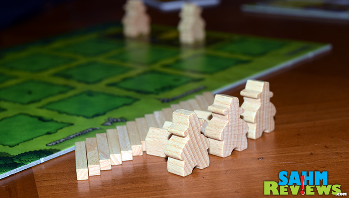 Players are working to create the best farm in Agricola by Mayfair Games. - SahmReviews.com