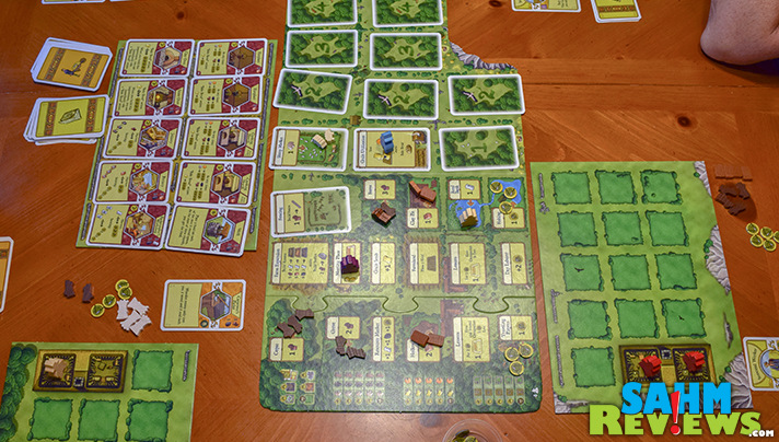 Players are working to create the best farm in Agricola by Mayfair Games. - SahmReviews.com