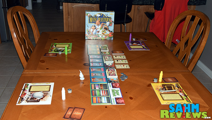 In Calliope Games' Titan series board game, Menu Masters, up to five chefs purchase ingredients in an effort to craft the best menu for their restaurant. - SahmReviews.com