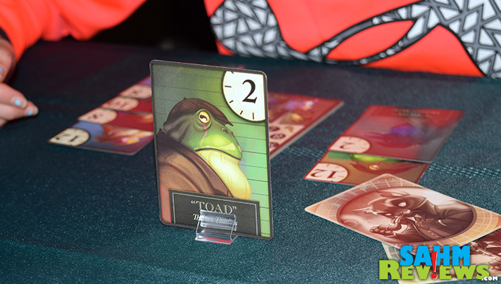 If Sherlock was a cat, would he still solve crimes? Purrrlock Holmes game by IDW Games is a cooperative deduction game based on the famous detective. - SahmReviews.com