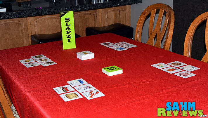 How to play SLAPZI, a new fast-paced and simple family card game from the people that created TENZI dice game. - SahmReviews.com
