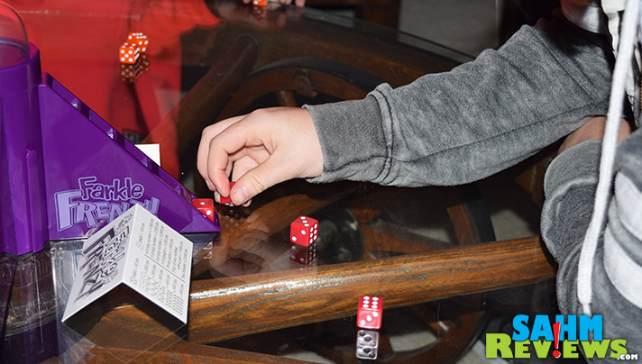 Farkle Frenzy tries to take the down time out of the classic game of Farkle. Find out if it is worth watching for at your local thrift store! - SahmReviews.com