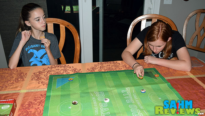 While we love learning new things from difficult board games, sometimes we want to play just for fun. Zoo Ball by Osprey Games gave us that chance! - SahmReviews.com