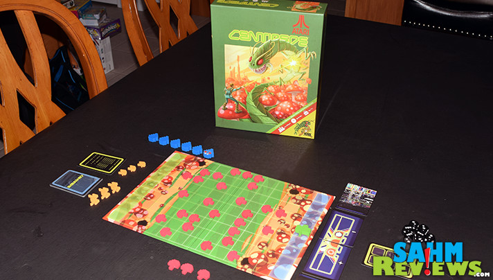 IDW Games certainly did justice to the experience of playing classic Centipede in their new Atari Centipede board game. So many quarters will be saved! - SahmReviews.com