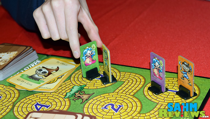 Whether you've played the original Munchkin or not, Munchkin Oz: Guest Artist Edition is one you'll want to play with any Wizard of Oz fan. You can even fight the witches! - SahmReviews.com