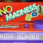 It's yet another version of UNO! Mattel's UNO Madness exchanges cards for tiles and adds a timer that penalizes you if it goes off on your turn. Find out more at SahmReviews.com!