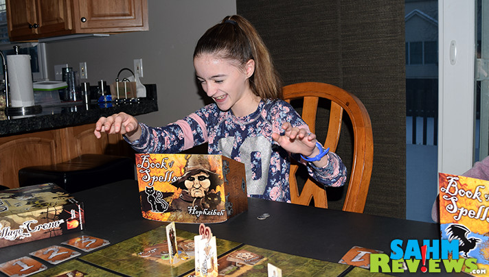 The Village Crone by Fireside Games has us flying around the town, turning villagers into frogs! Find out why we're on such a tear by checking out our game overview! - SahmReviews.com