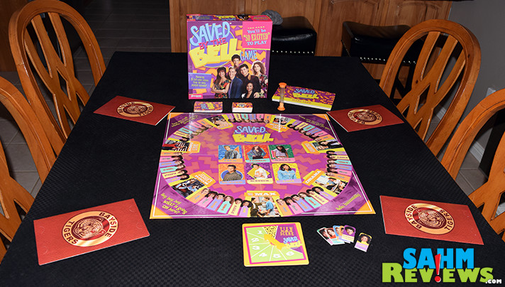 It's a flashback to the 90's with Pressman's Saved by the Bell Game. Test your memory and relive your crush on Kelly Kopowski with this brand new game! - SahmReviews.com