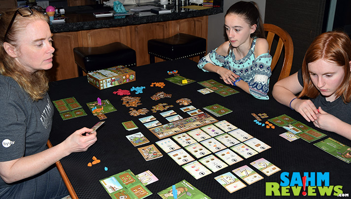 Can you plow, build, plant and grow a crop in under an hour? You can in Tasty Minstrel Games' brand new Harvest game. Find out why it is now in our travel bag! - SahmReviews.com