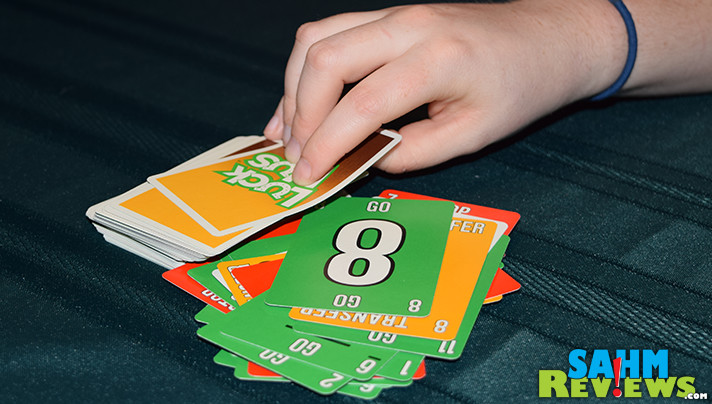 Luck Plus is another game by the same people behind UNO. Is it an UNO clone or something brand new? You'll have to read more to find out! - SahmReviews.com