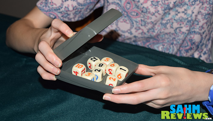We always pass on Rummikub at thrift since we own a copy or two. But this variation caught our eye. See what we discovered about Rummikub Rummy Dice Game! - SahmReviews.com