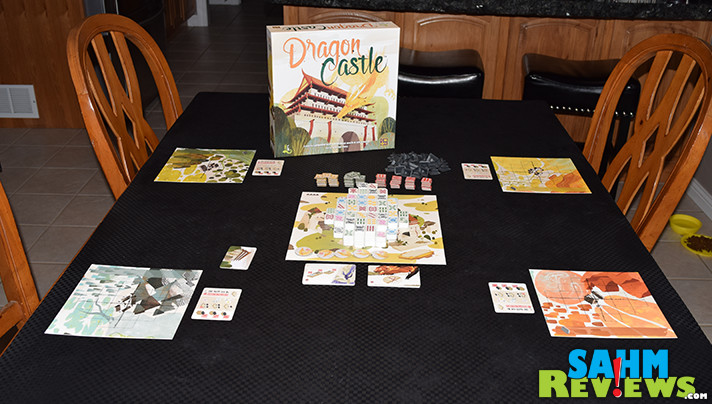 While the components will remind you of Mahjong, that's the end of the similarities. Find out how Dragon Castle is nothing like the classic tile game! - SahmReviews.com