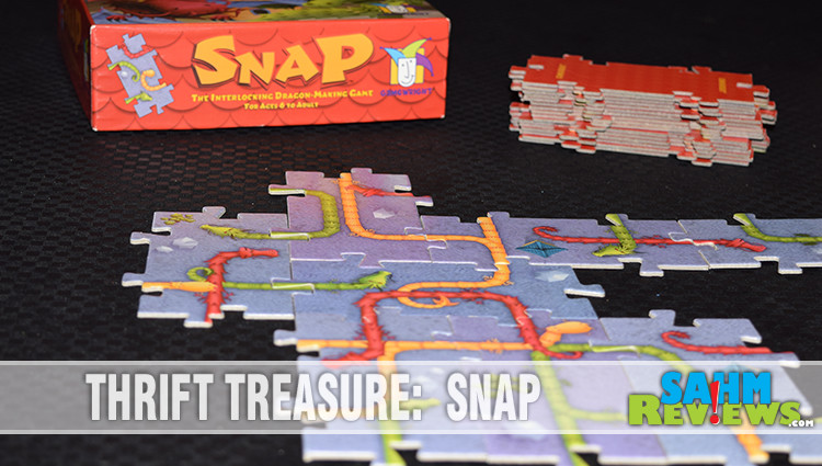 Building dragons should be a course we all take! Snap by Gamewright Games rewards us for the biggest and baddest in this puzzle-like game! - SahmReviews.com