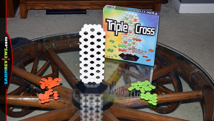 Triple Cross is very different than the other 3-in-a-row games we've played. In fact, you need to line up as many as you can and block your opponent! - SahmReviews.com