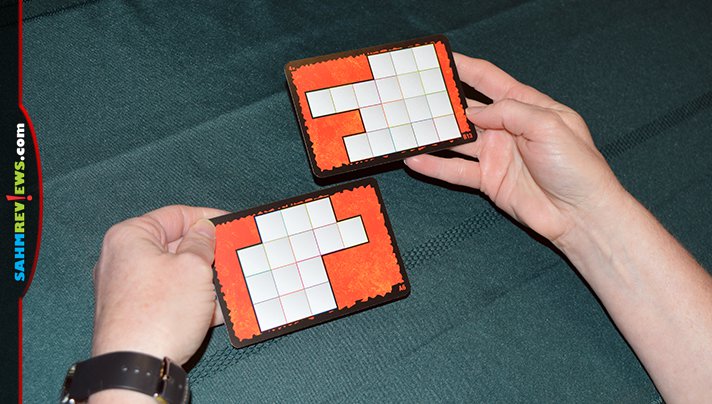 Ubongo puzzle game from Kosmos is a fast-paced geometric puzzle using polyomino pieces. - SahmReviews.com