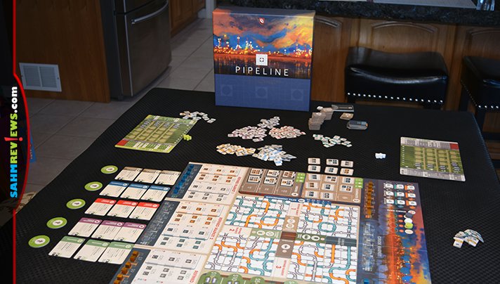 Build pipelines, buy, upgrade and sell oil barrels and fill contracts in Capstone Games' Pipeline board game. Read about the layers of this strategy game. - SahmReviews.com