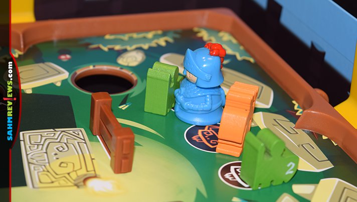 Slide the knight through the obstacles in this labyrinth-style cooperative game. Read more about Slide Quest from Blue Orange Games. - SahmReviews.com