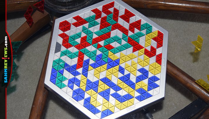 The collection is finally complete! We found this copy of Blokus Trigon, but it was missing a piece. Thanks to a friend, we had the perfect solution! - SahmReviews.com