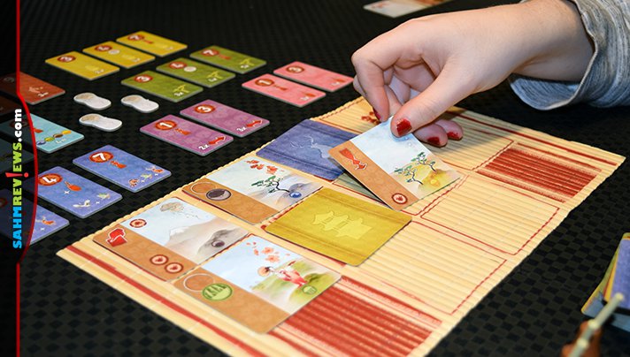 Most art-themed games assume you're already an artist of some type. In Kanagawa by iello, you must first learn how to paint before you can become a master! - SahmReviews.com
