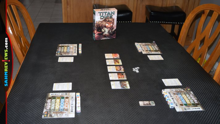 Other games we've played have you battling Titans. In Titan Dice, you ARE the Titans! Roll dice to capture enough creatures to fight the gods! - SahmReviews.com