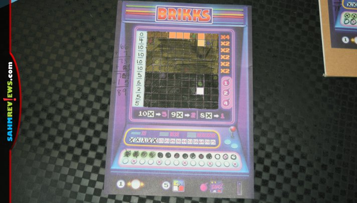 Brikks from Stronghold Games is an analog, roll-and-write take on the popular tetromino-dropping video game we all are familiar with. - SahmReviews.com
