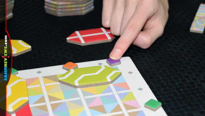 Passtally by Pandasaurus Games might remind you of another tile game you've played, but this abstract is completely new. The higher you go, the more points! - SahmReviews.com