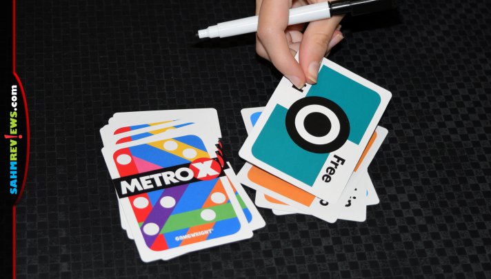 Feel the anxiety of mass transit during a trip to your game table in Metro X, a flip and write train-themed game from Gamewright. - SahmReviews.com